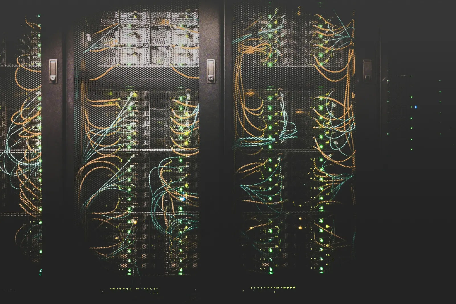 Network cables running into a server rack